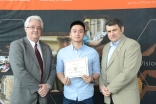Shuai Yang with Dean Lague (L) and Canadian Soceity for Civil Engineering representative (R).